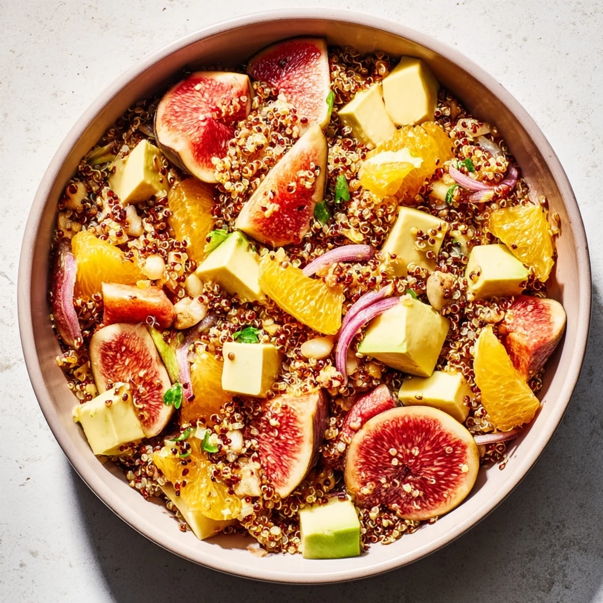 Fresh Citrus & Avocado Quinoa Bowl with bright citrus fruits and creamy avocado arranged beautifully.