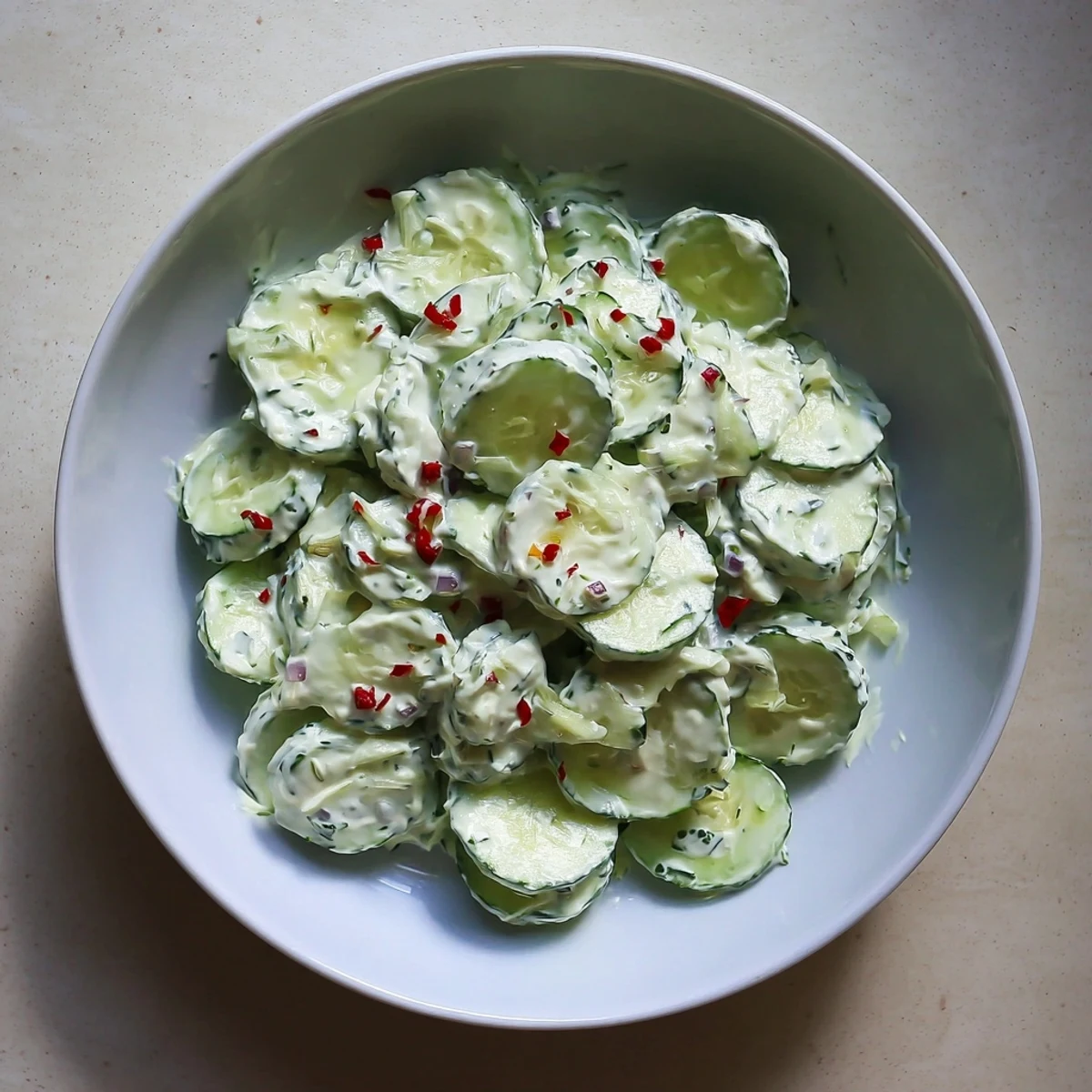 Creamy Tzatziki Salad starring cool cucumbers, Greek yogurt, and fresh herbs, perfect for serving immediately.