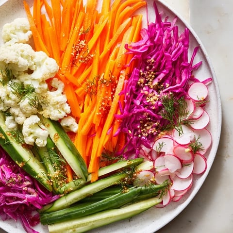 Vibrant, colorful pickled and fermented vegetables star in this inviting Pickled & Fermented Feast platter.